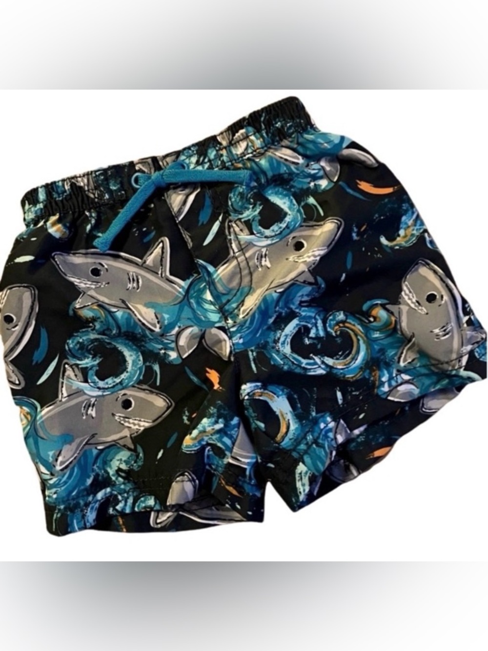 Sharks swim trunks Place 3-6 mos.